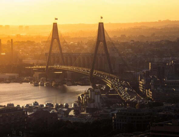 Anzac Bridge in Sydney at sunset, hazy skyline showing poor air quality